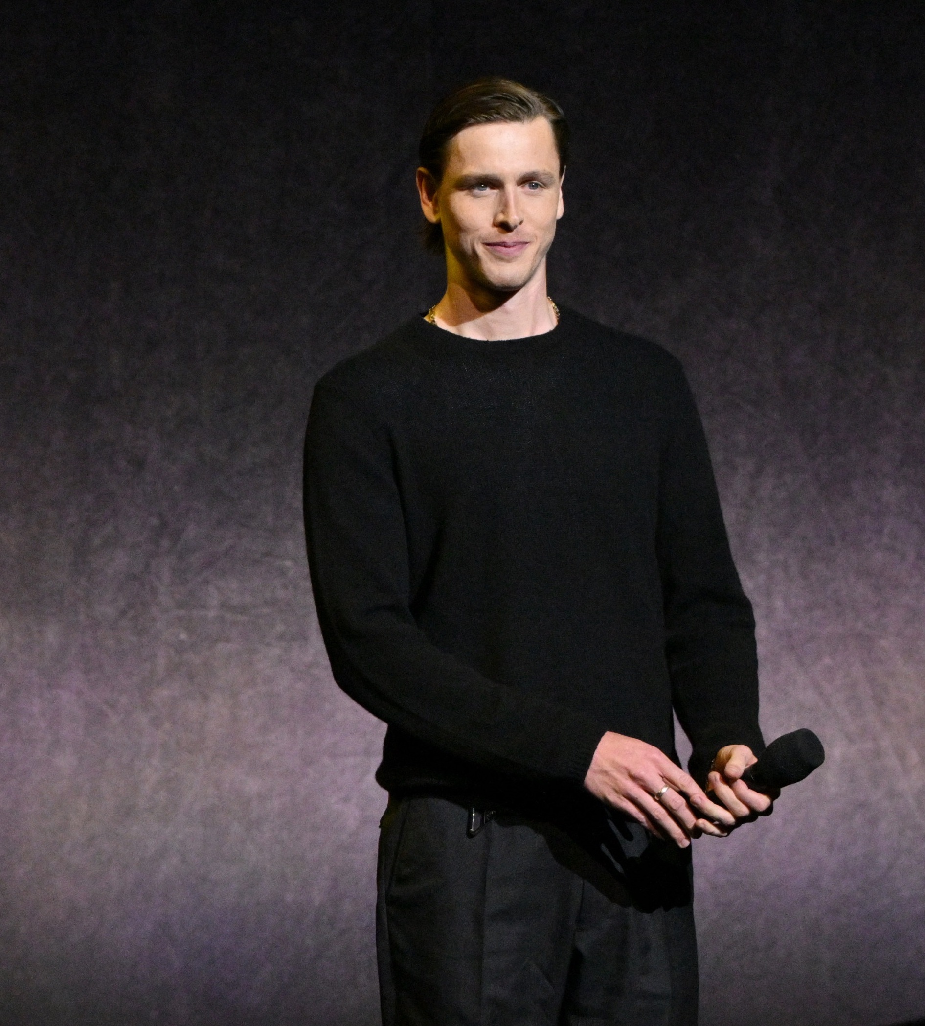 Harris Dickinson Arrives in Style at CinemaCon, Announces John Lennon Role