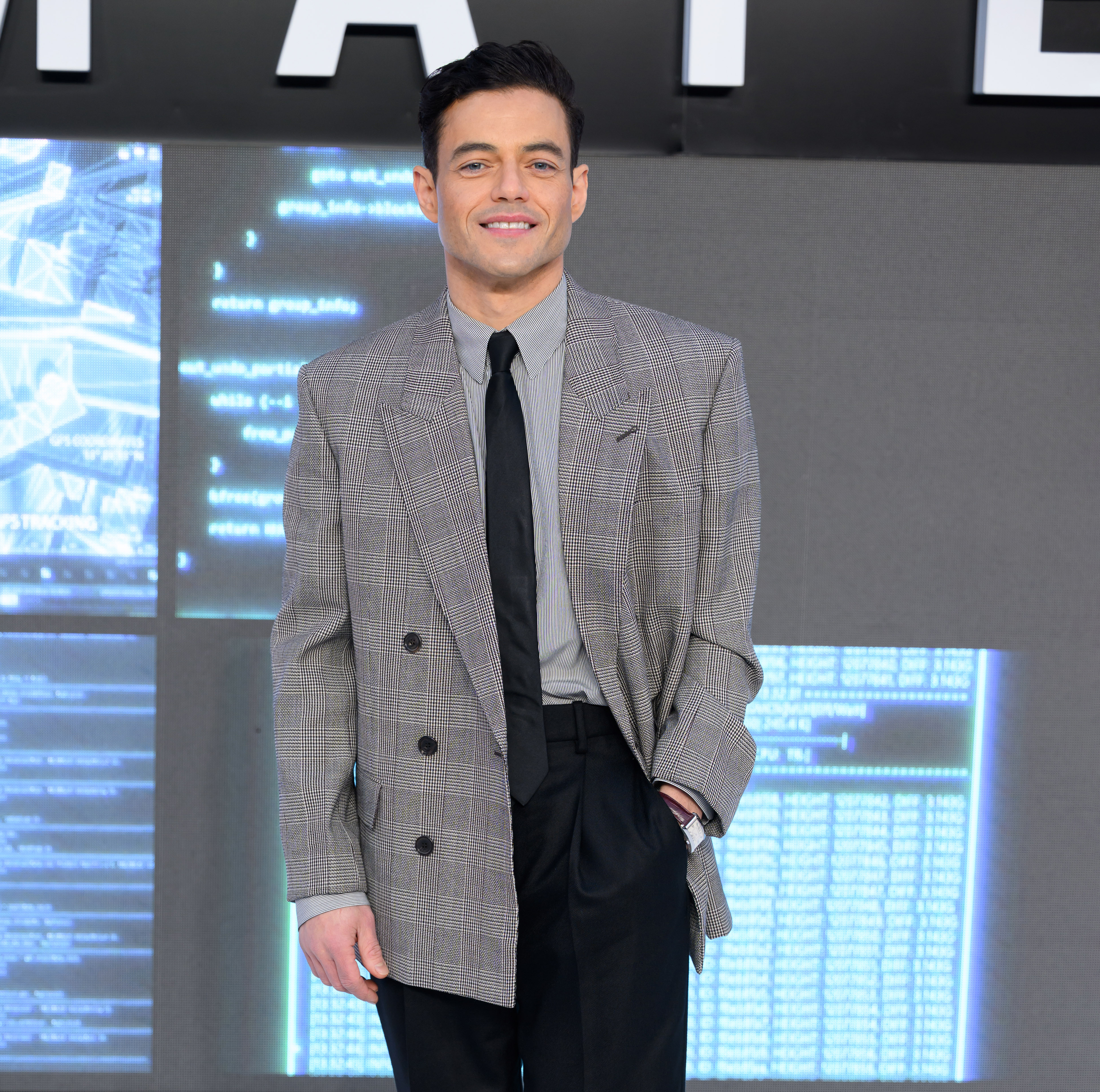Rami Malek Takes 'The Amateur' Press Tour in Style