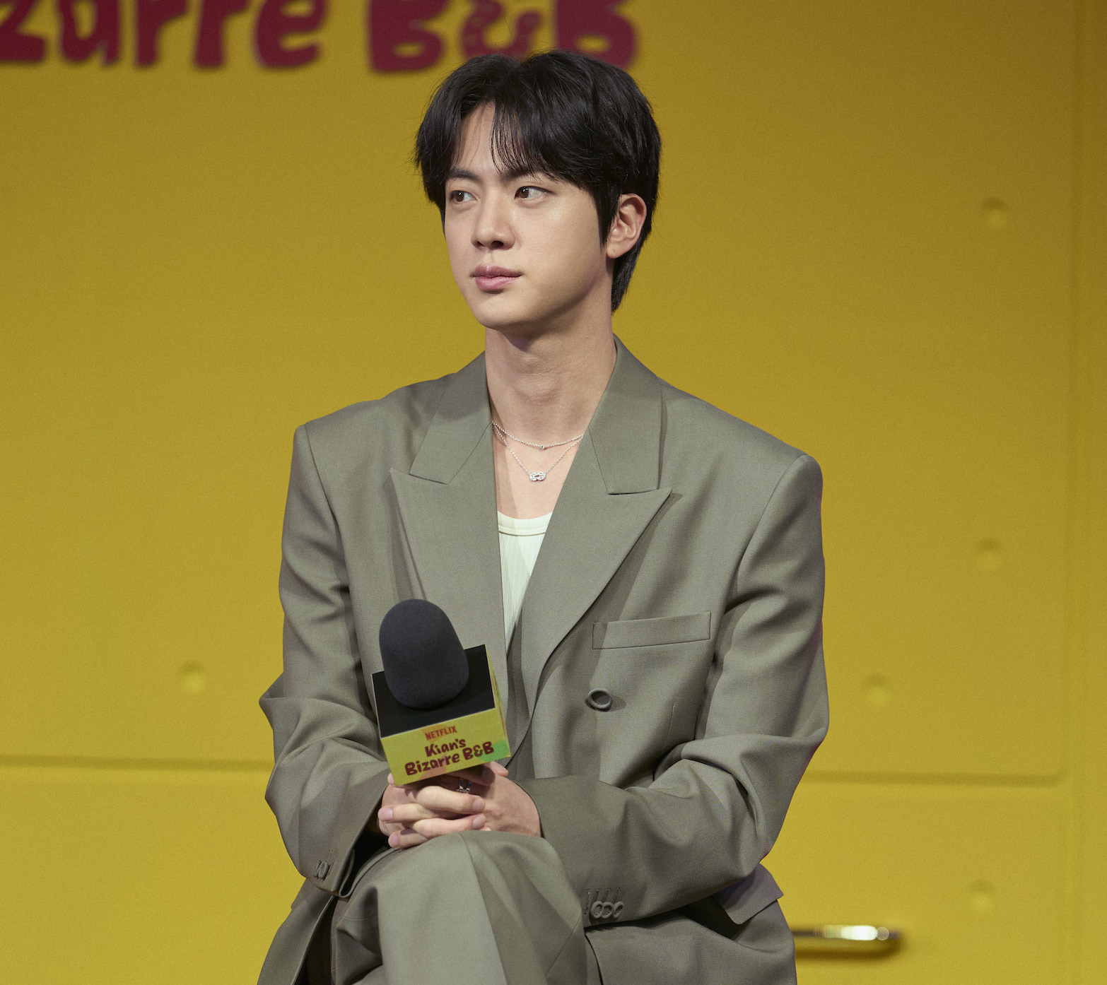 Jin of BTS Stuns in Gucci at Kian’s Bizarre B&B Press Conference