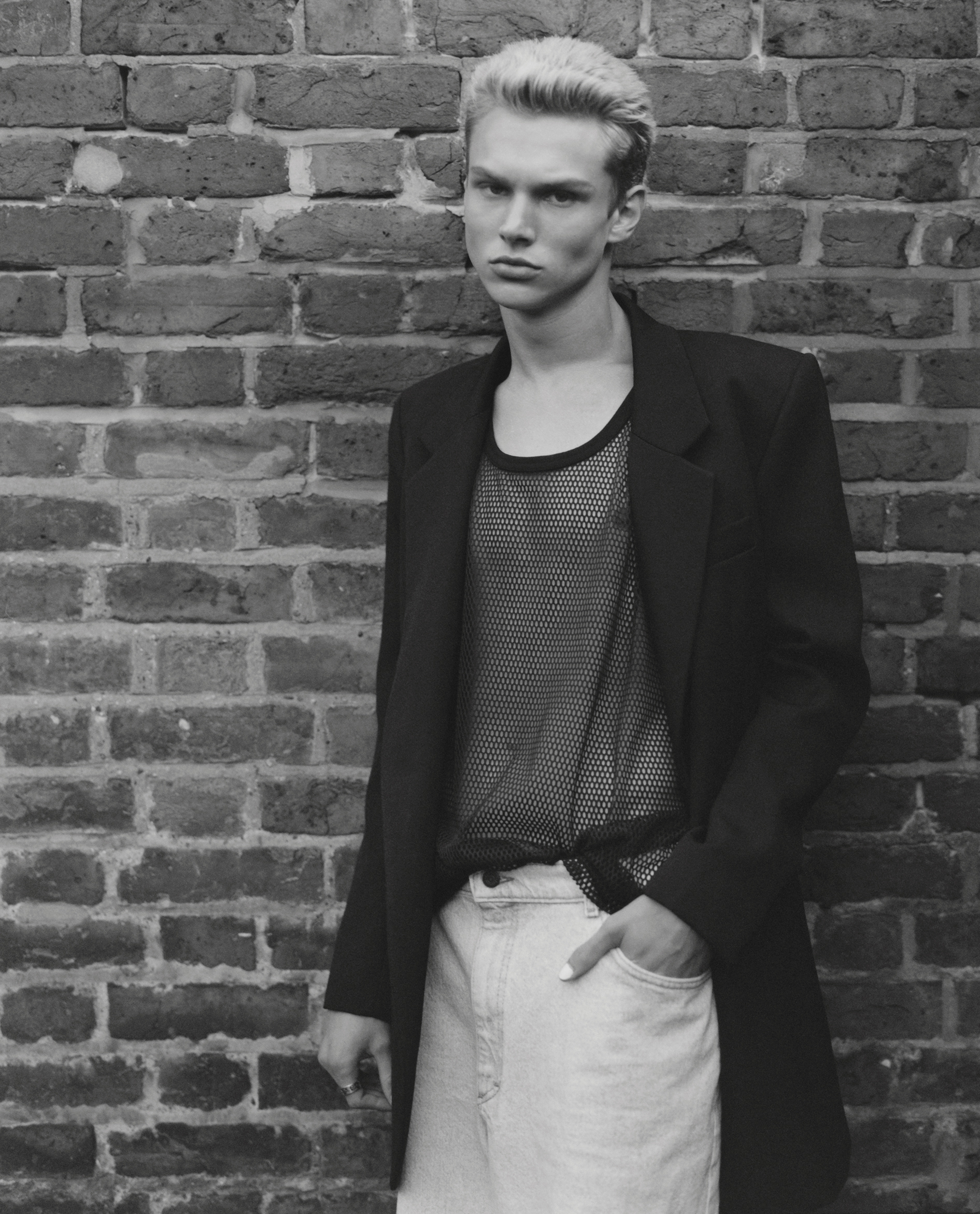 Luke wears total look by AMI